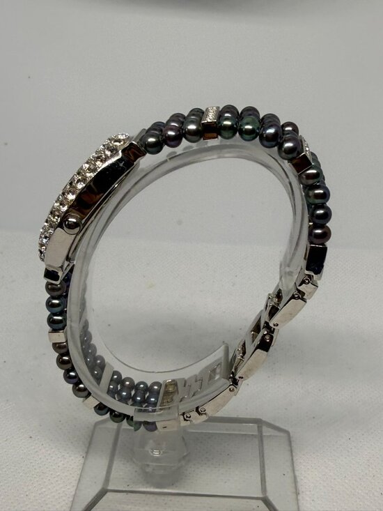 Croton Women Silver Oval Crystal Pavé Bezel MOP Dial Black Pearl Bracelet Watch